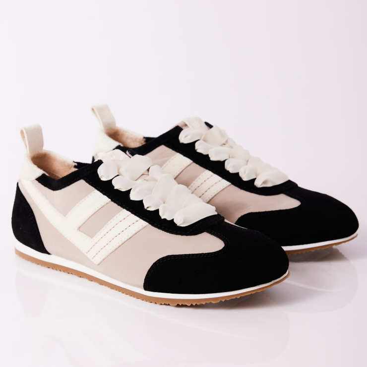 Free People's Aces Tennis Shoes are available at Harbour Thread. They features a low top profile and ribbon laces.