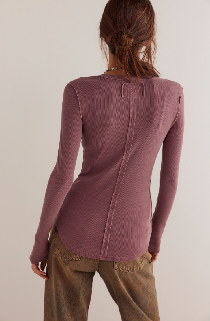 Women's long sleeve fitted top with exposed seaming from Free People