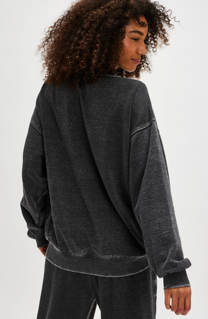 The black Slow It Down Pullover by Free People