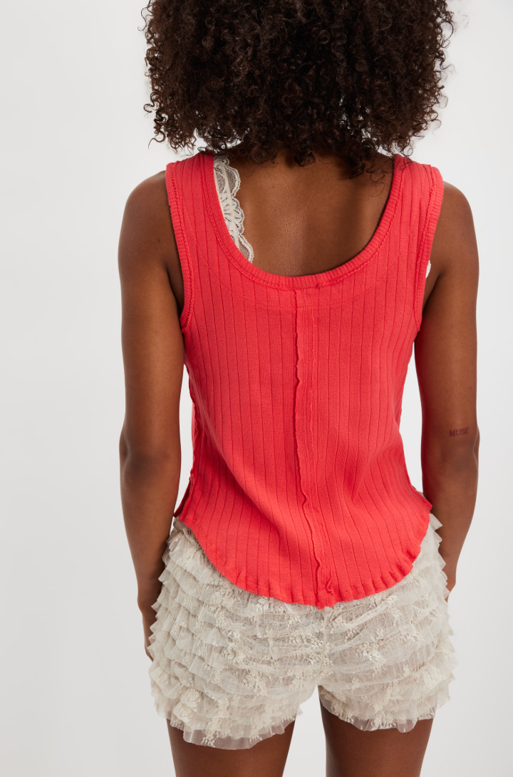 The Free People Bryson Henley Tank is sustainably crafted from a recycled/organic cotton blend