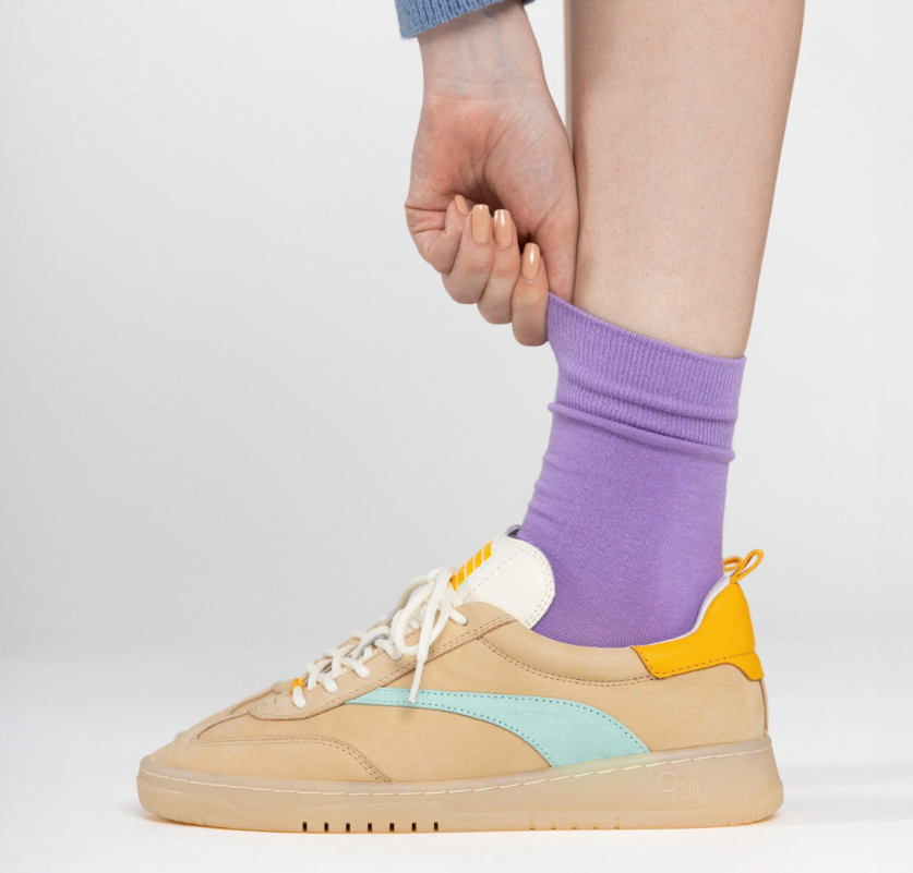 A person wearing the Oak Panama Sneaker by Oncept