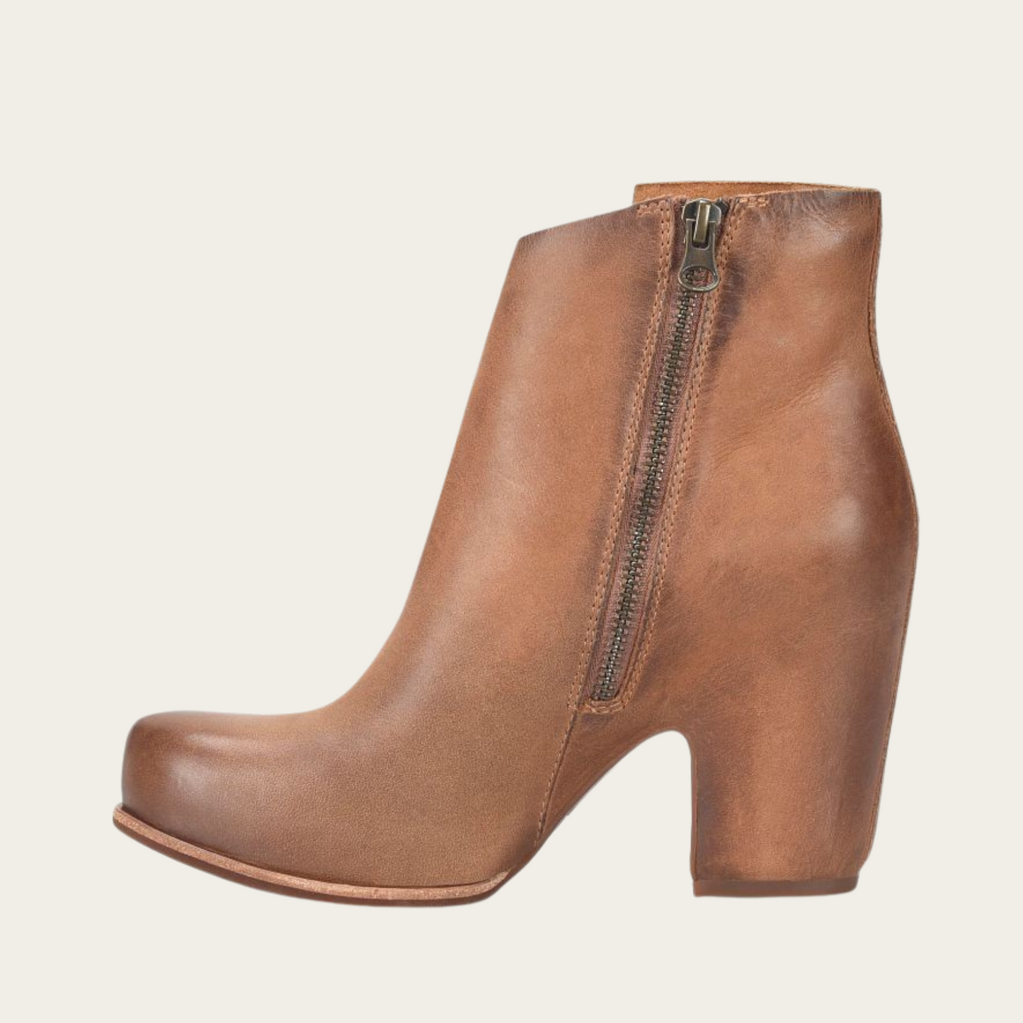 The brown leather Seeley hidden platform bootie by Kork-Ease offers an interior zip closure for easy on and off