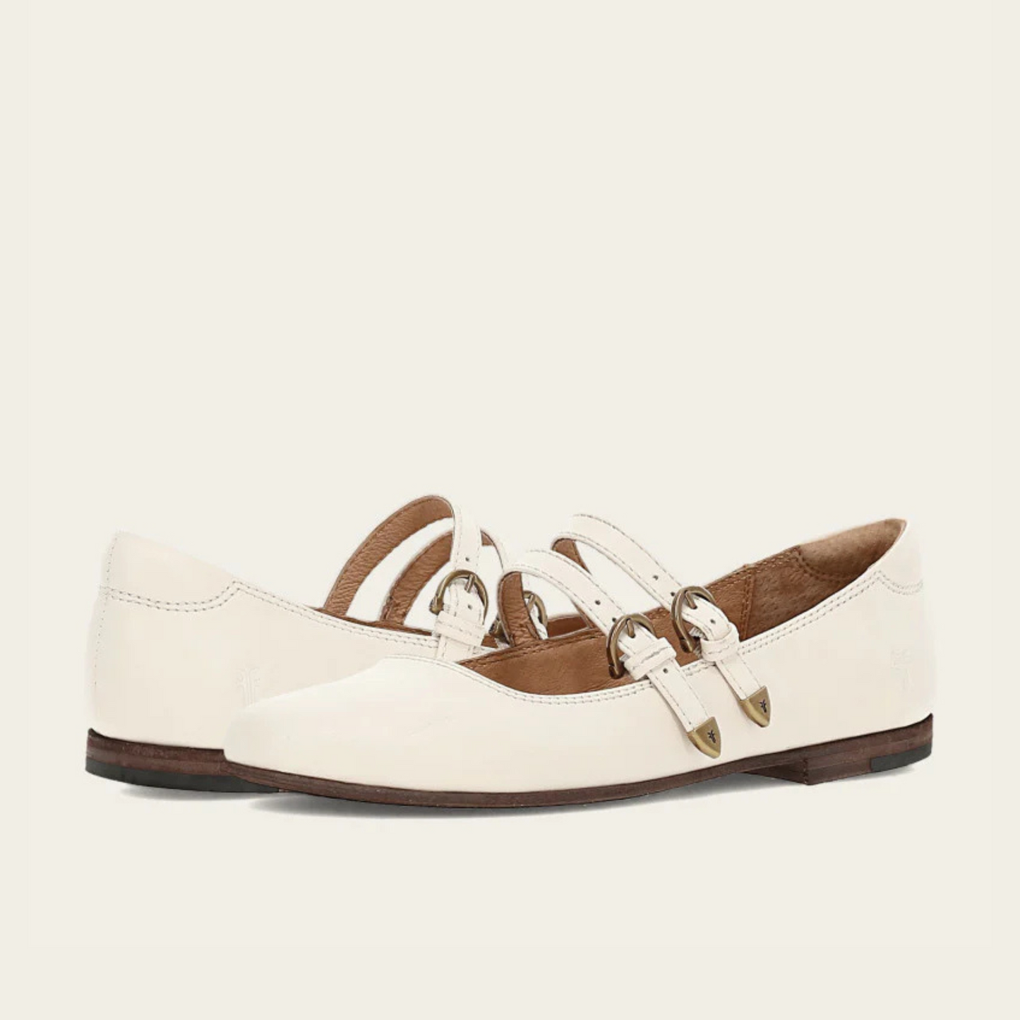 A pair of white double straps Mary Janes from Frye