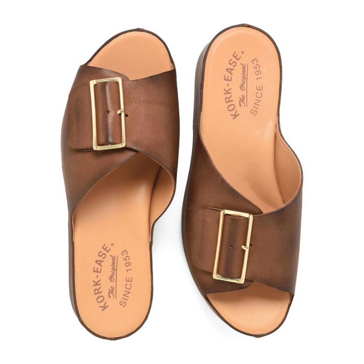 A pair of brown slide sandals with a gold buckle details and visible Kork-Ease branding