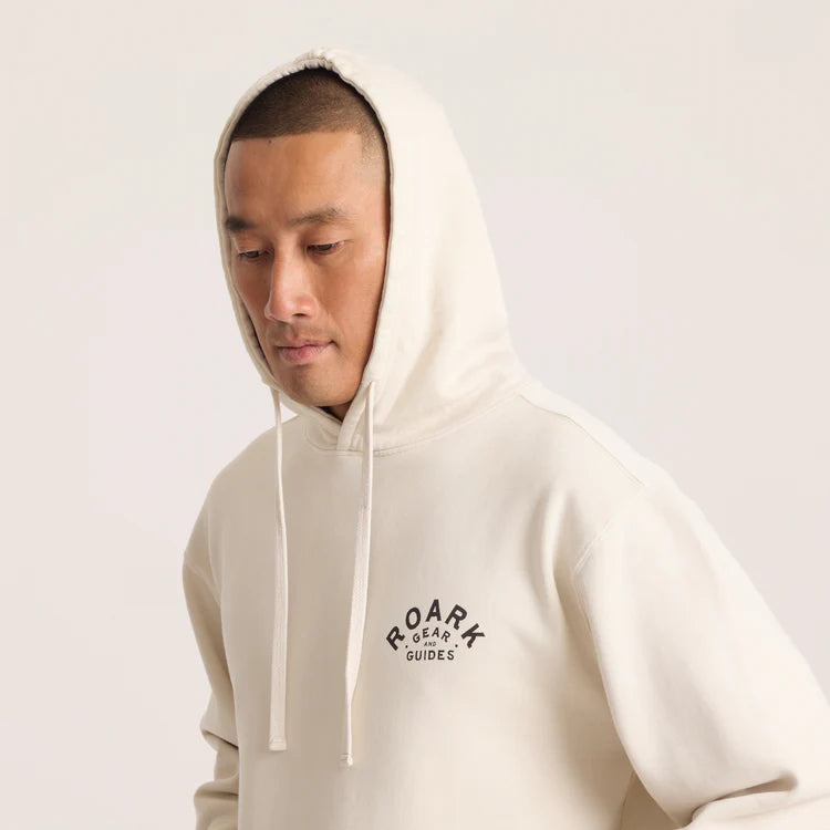 The Roark Gear And Guides Hoodie features a small custom Roark chest graphic and drawstring hood