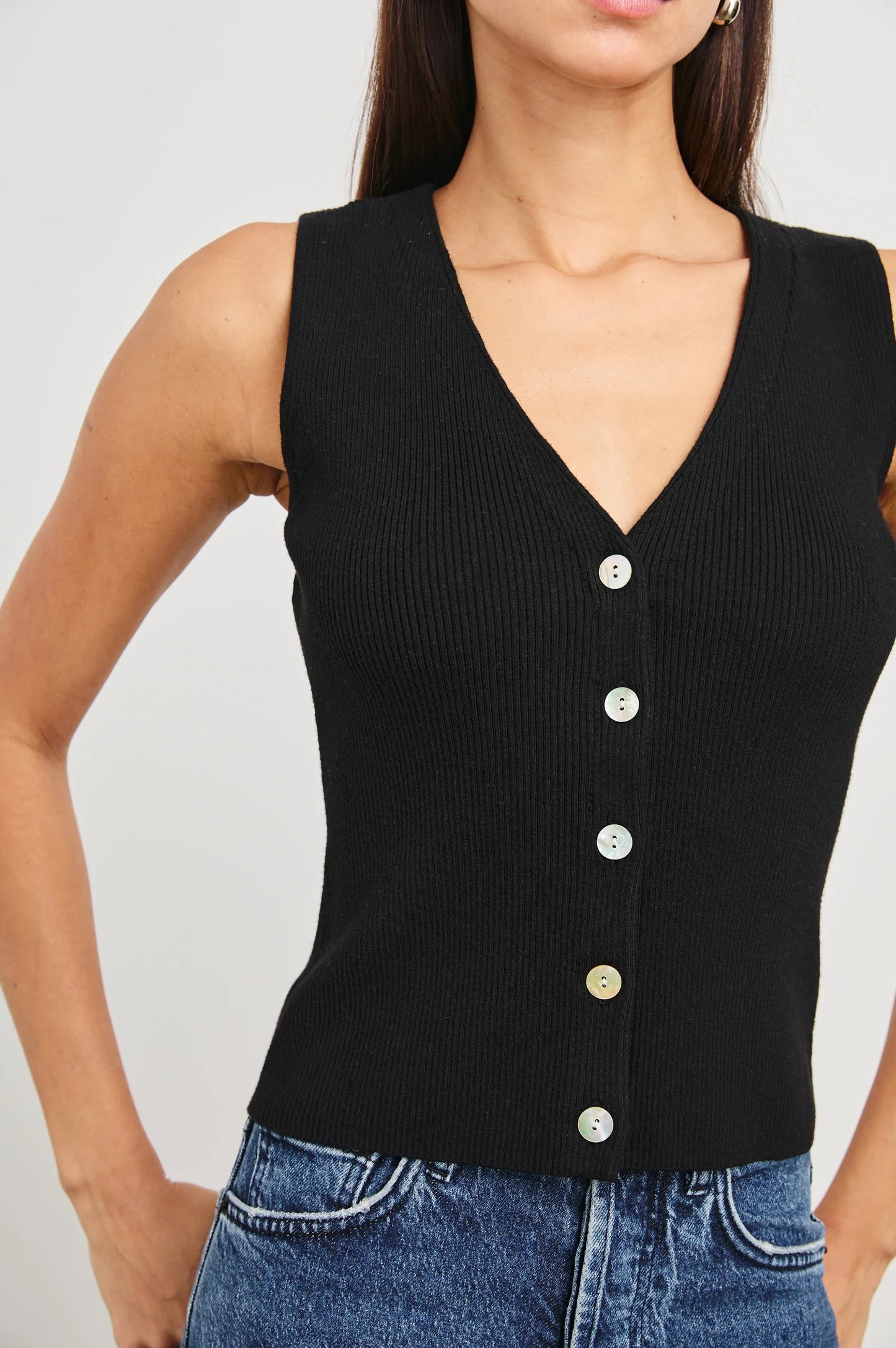 Women's black front button vest top