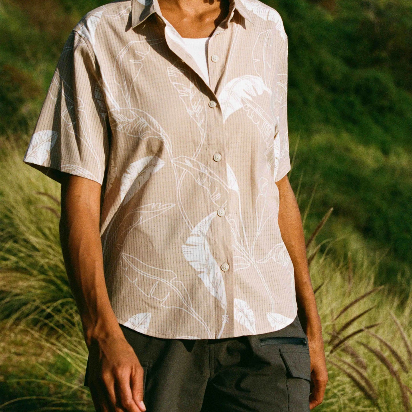 The Roark Women's Bless Up Breathable Stretch Shirt at Harbour Thread is crafted from breathable, perforated fabric.