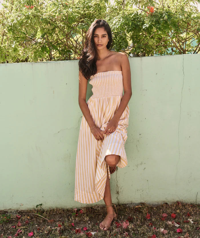 The Marine Layer Sutton Strapless Maxi at Harbour Thread features a smocked bodice with removable straps, allowing you to switch things up in style.