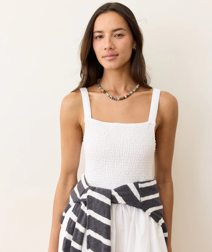 The Marine Layer Selene Eyelet Maxi Dress features a smocked bodice for your perfect fit