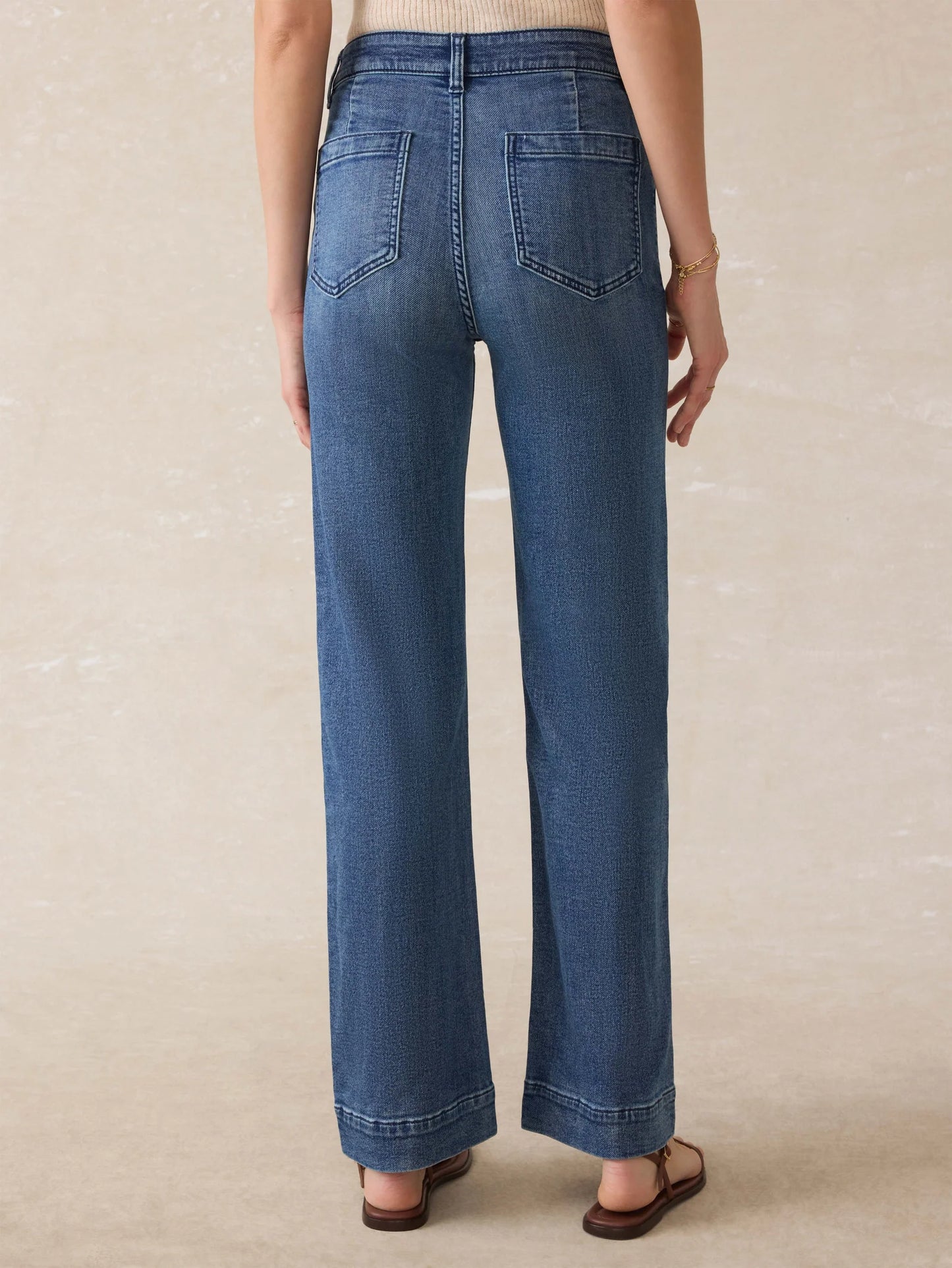 Person wearing blue jeans from Faherty