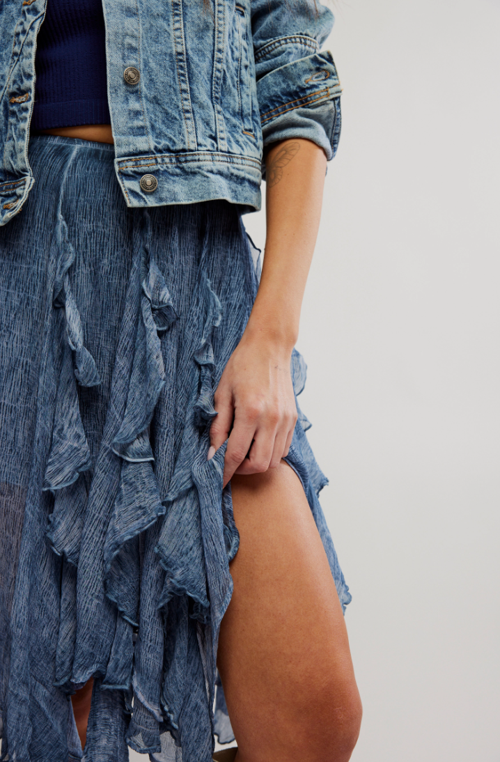 The Free People Susanna Knee-Length Midi Skirt offers a pieced asymmetrical fit