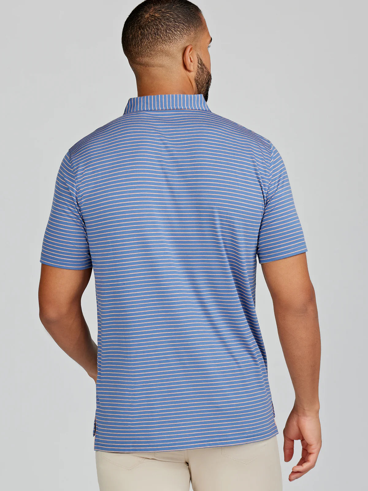 Back view of the Cloud Lightweight Polo Brookline Stripe by Tasc Performance