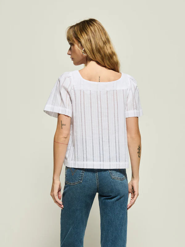Sheer white cotton tie top with a relaxed fit