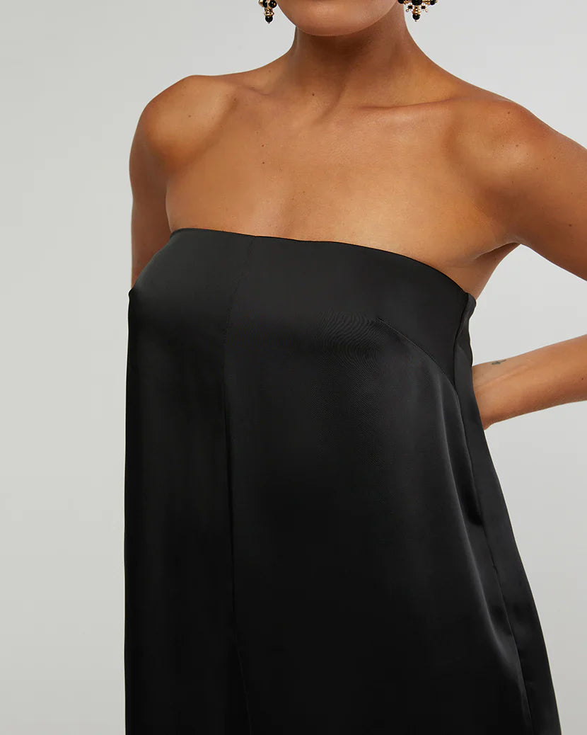 Shop this black silky charmeuse relaxed fit strapless jumpsuit by WeWoreWhat at Harbour Thread.