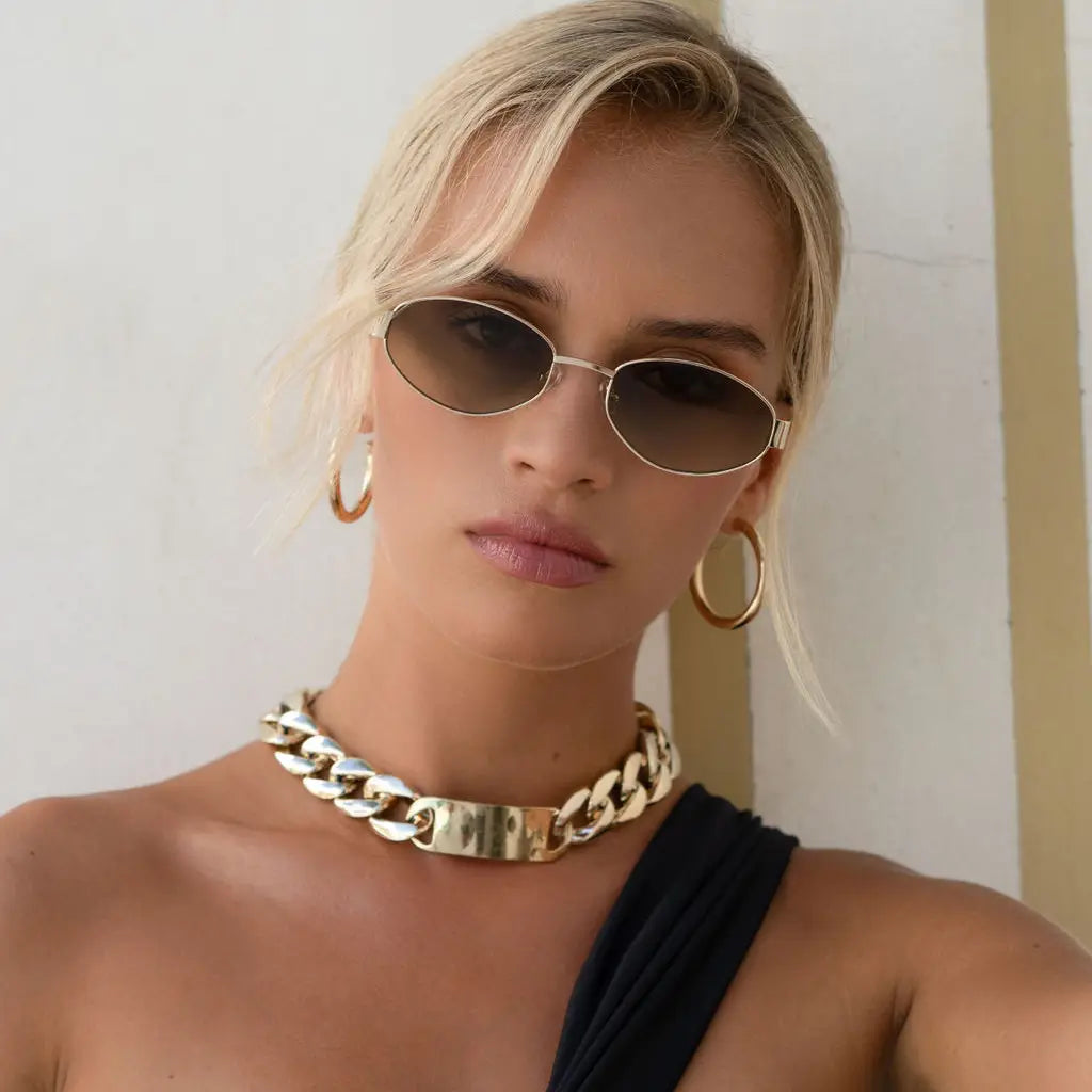 The FREYRS Soho Women's Oval Sunglasses are available at Harbour Thread boutique in the color Gold/Green