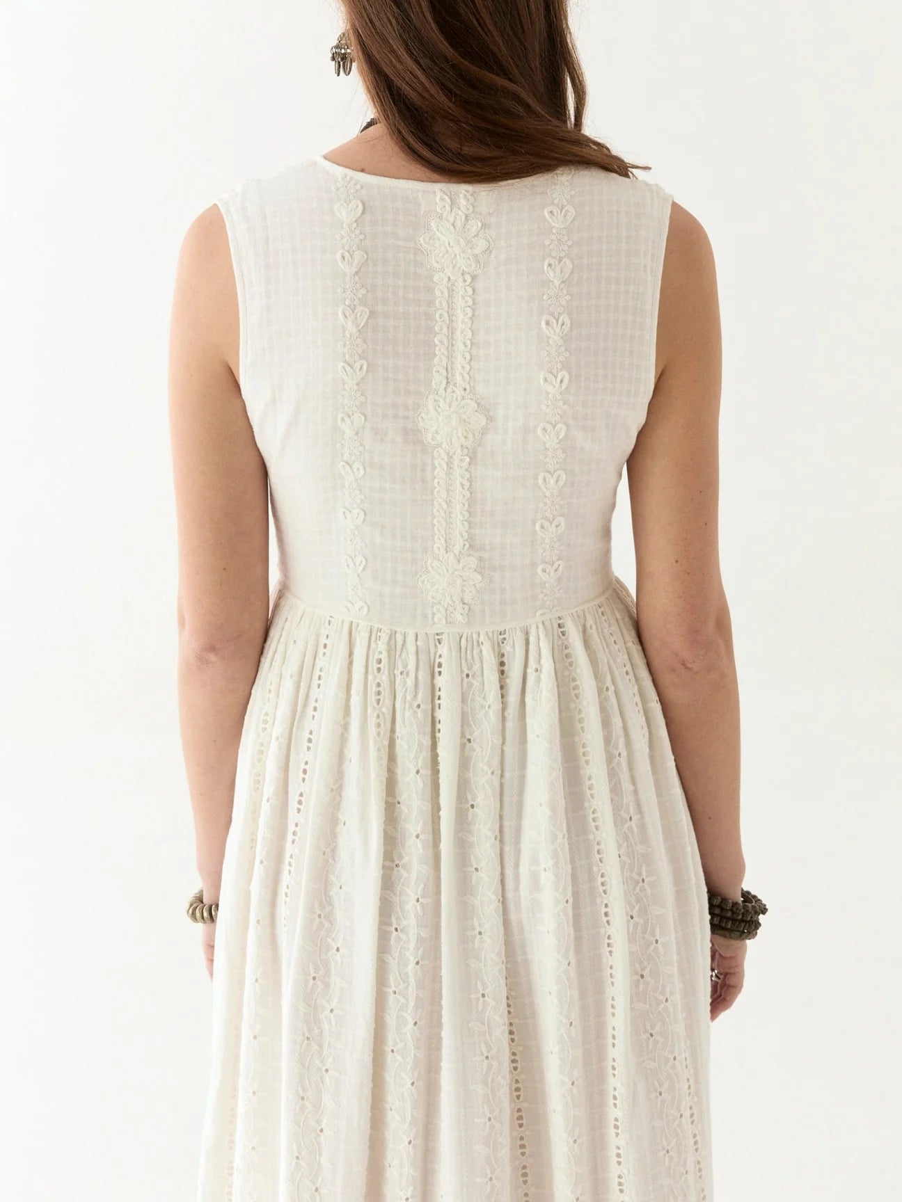 Sleeveless white cotton embroidered dress