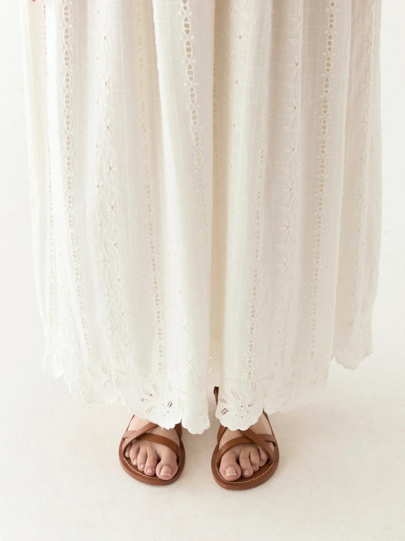Soft ivory fabric with delicate embroidery