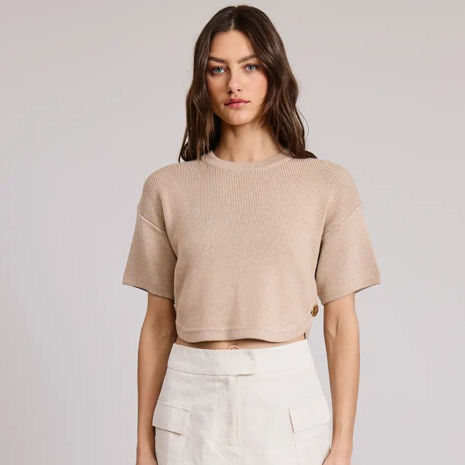 A woman wearing the Paris Sweater Crewneck Top by Flat White