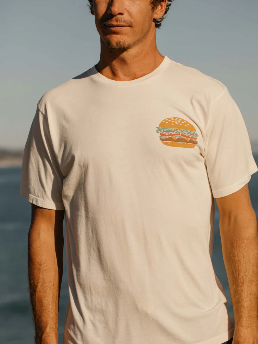 The Mollusk Men's Cheeseburger Tee offers a relaxed and casual fit that's perfect for your everyday style. Shop yours at Harbour Thread in St. Pete, FL!