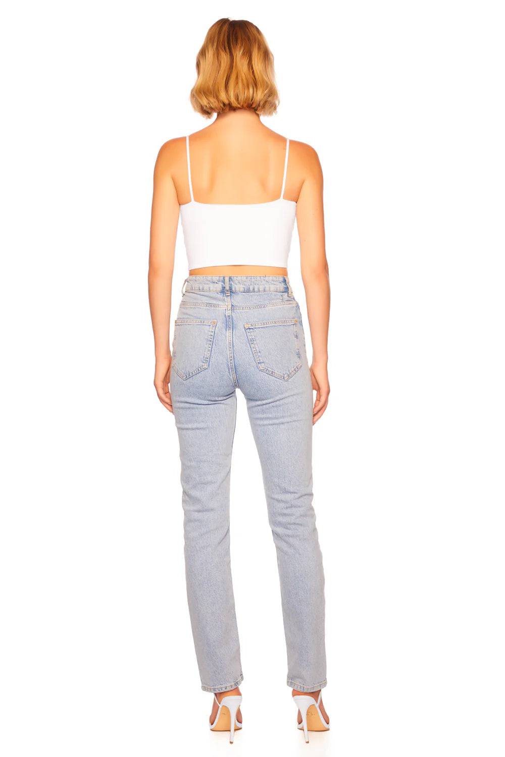 Back view of the The Susana Monaco Essential String Crop Top paired with jeans