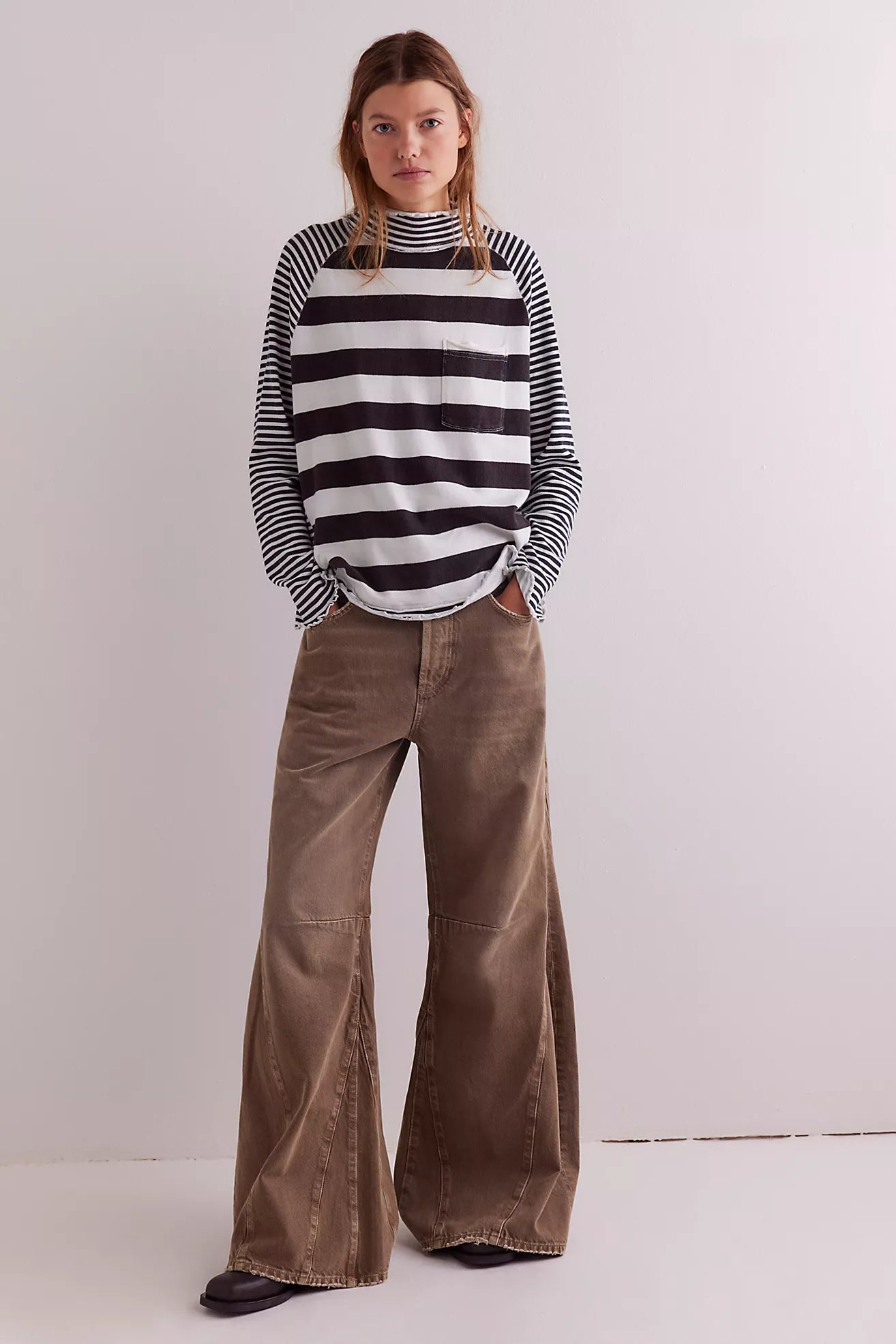 Woman wearing the Free People Punk Playful Tee in Black Combo