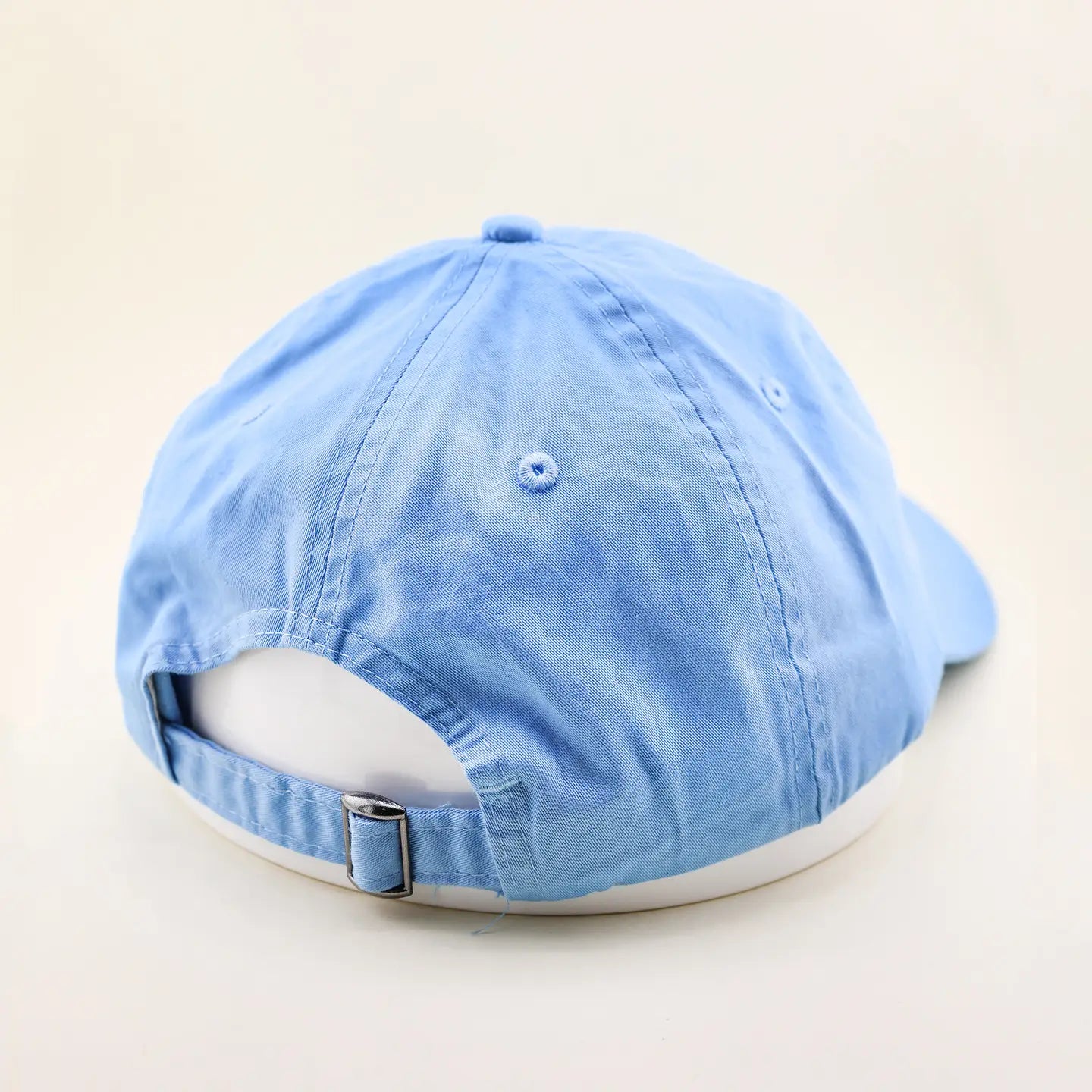 Women's blue adjustable baseball-style hat