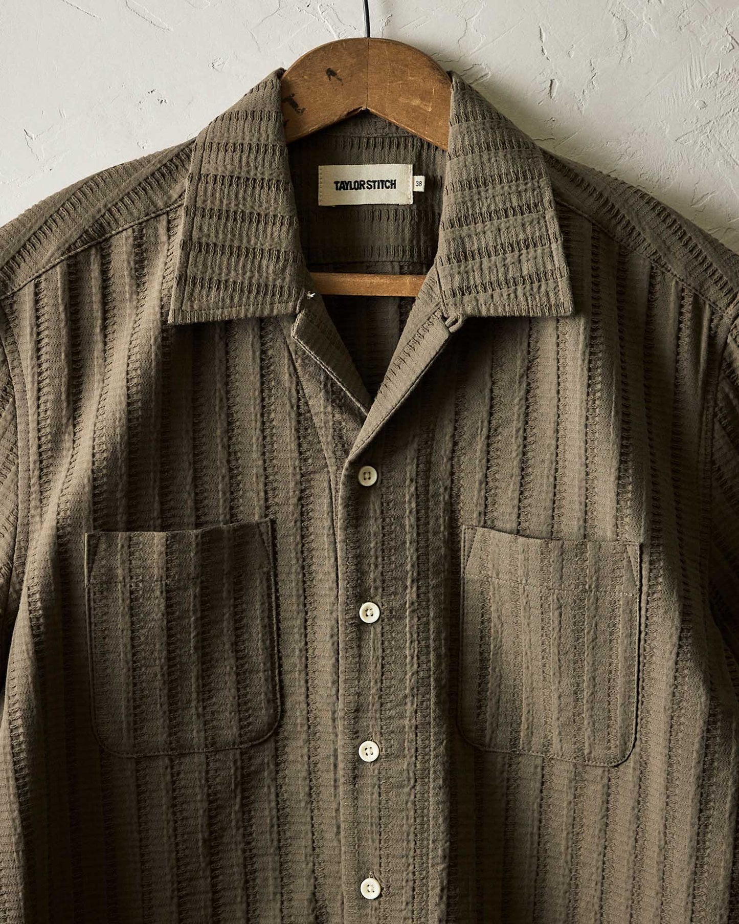 The The Conrad Shirt in Fatigue Olive Dobby Stripe by Taylor Stitch is now at Harbour Thread boutique in St. Pete, FL.