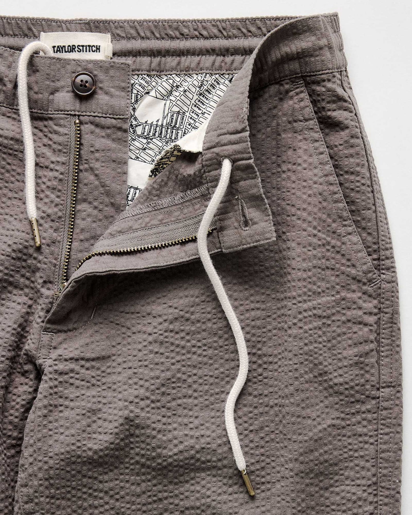 The Easy Pant by Taylor Stitch offers zip fly and button closure with internal drawstring