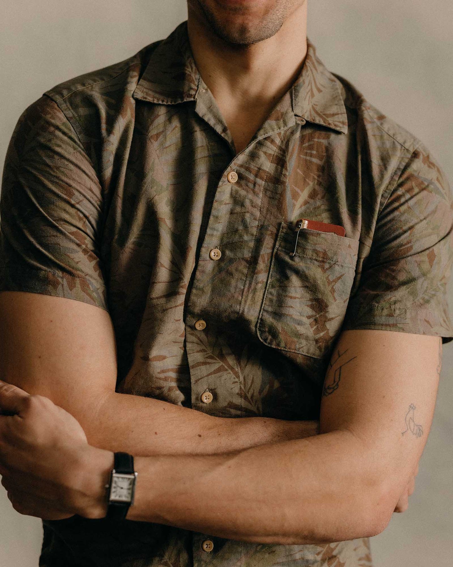 The Fatigue Olive Desert Palm print on the Taylor Stitch Hawthorne Shirt is overdyed for a more vintage, washed-out look.