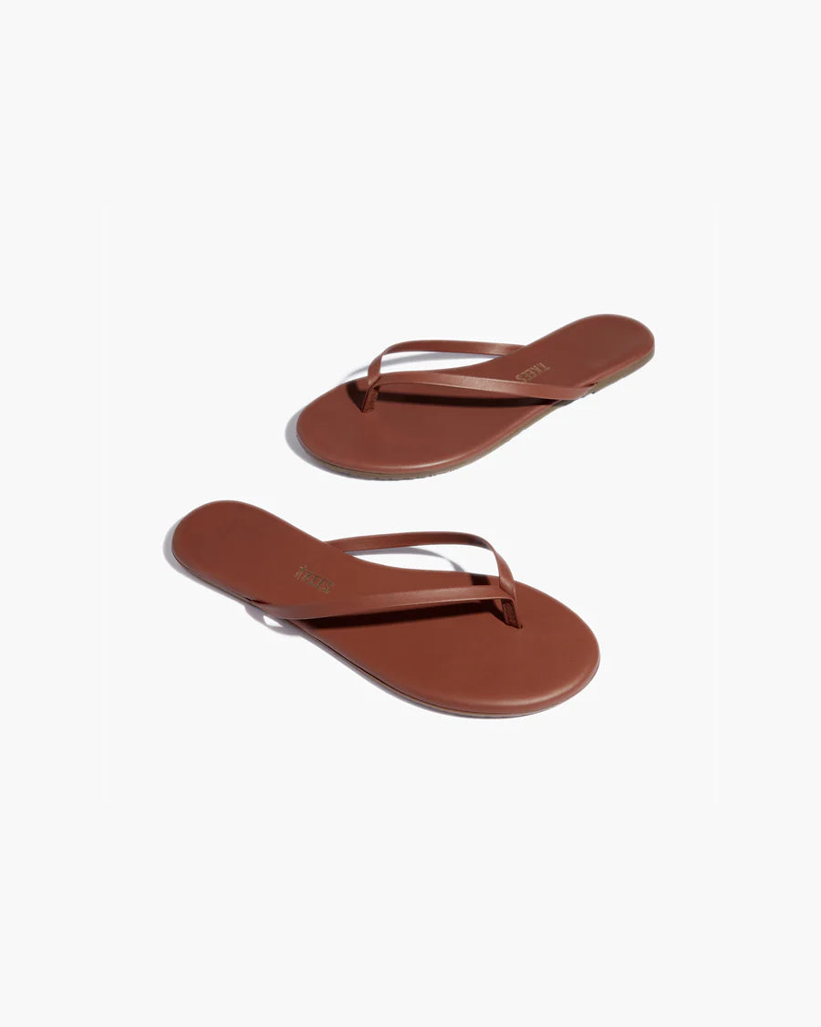 brown leather flip flops