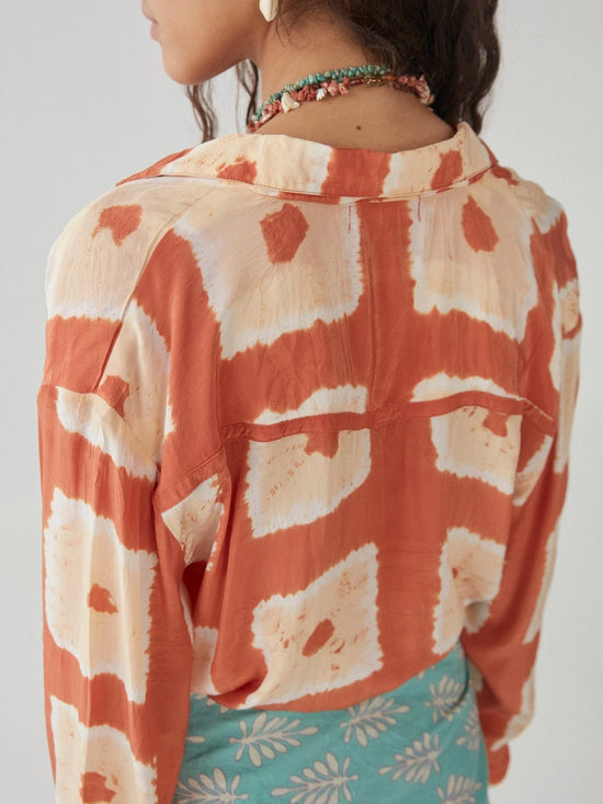 Back view of Maison Hotel's Trapeze Palmira Blouse in the color Terracotta