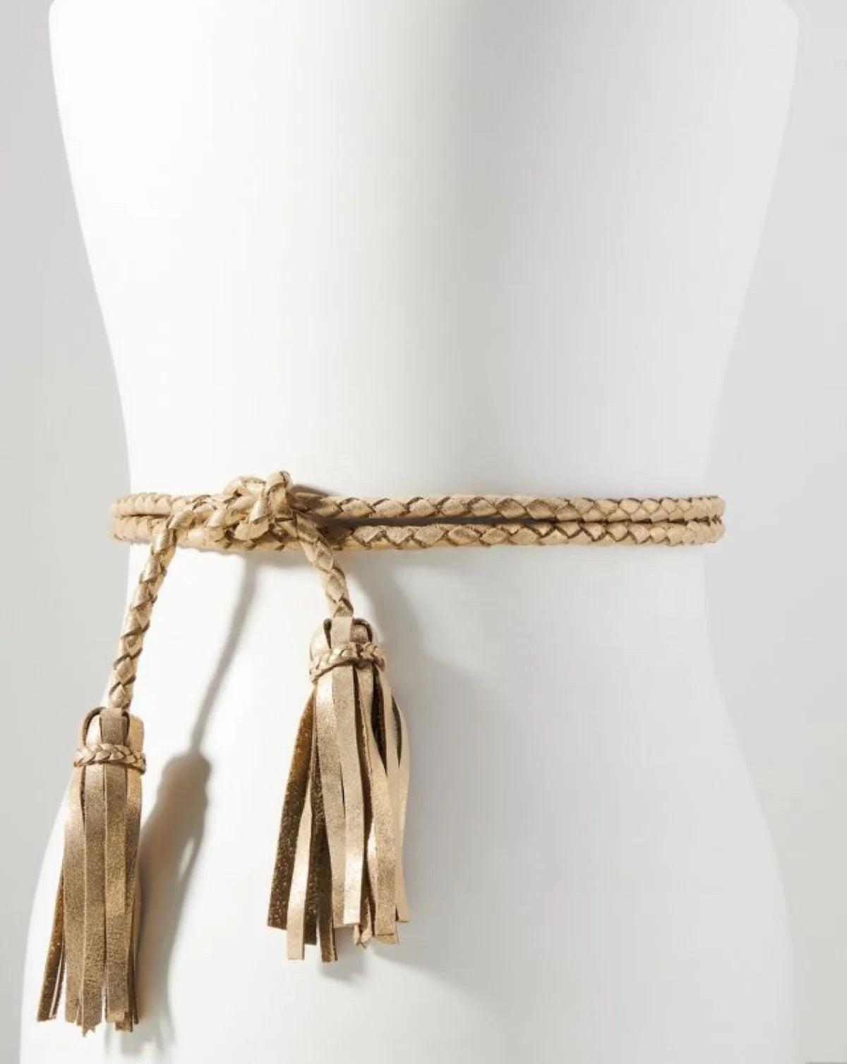 Braided belt with tassels on a mannequin