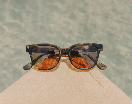 Dive into classic summer style with the Sunski Miho Unisex Sunglasses at Harbour Thread boutique in Burlington, VT.