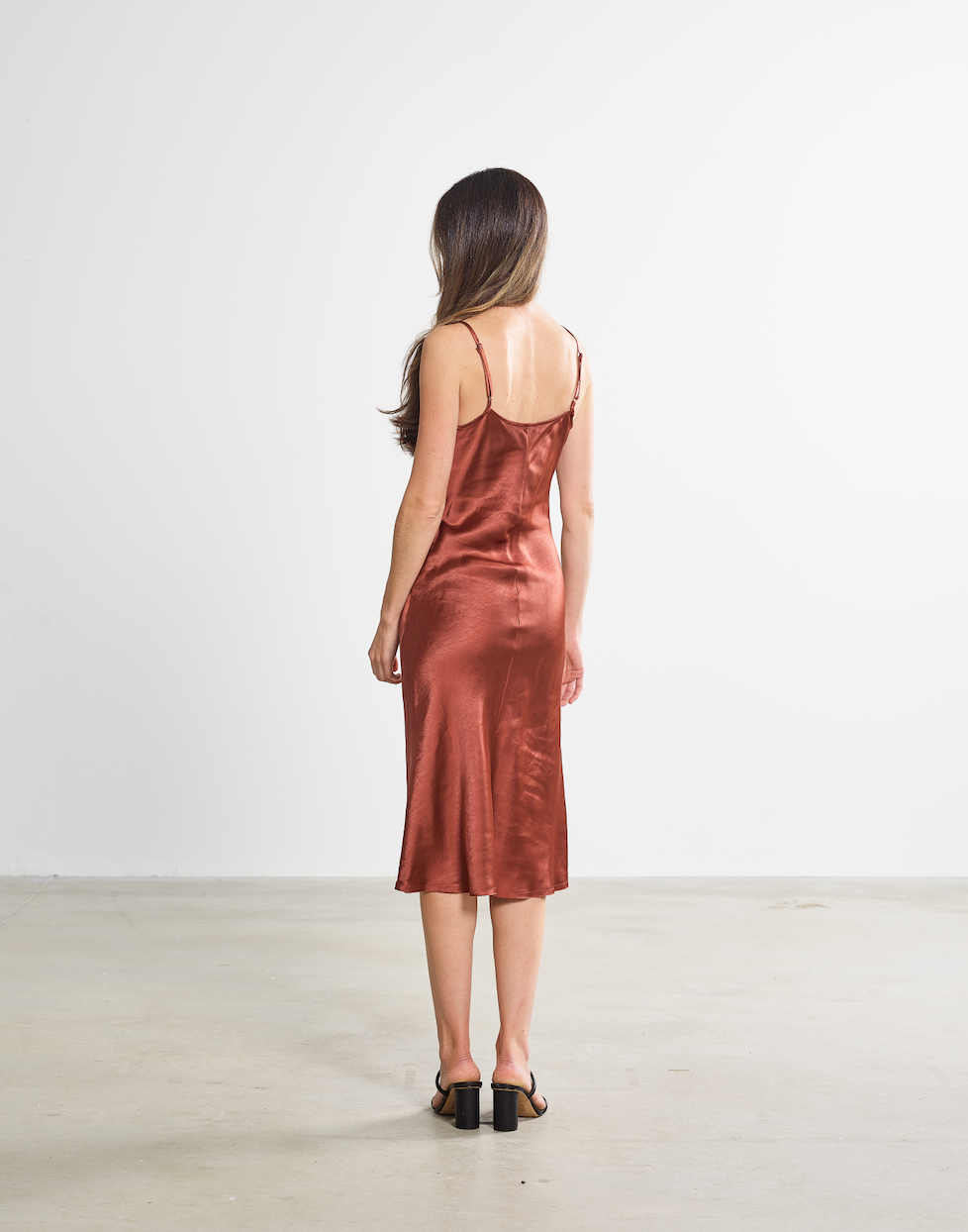 The sawyer women's midi slip dress in color rust
