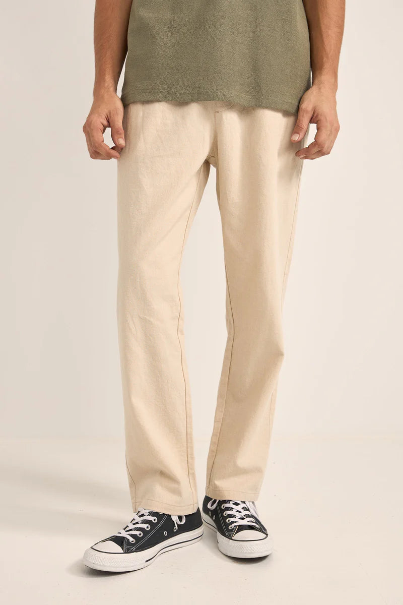 Now available at Harbour Thread, these linen-blend men's pants from Rhythm feature an elastic drawstring waist for relaxed comfort.