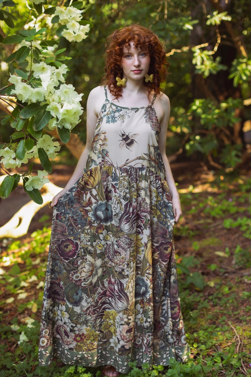 This whimsical Market Of Stars dress features lush botanicals and bees. Find yours at Harbour Thread in Burlington, VT. 