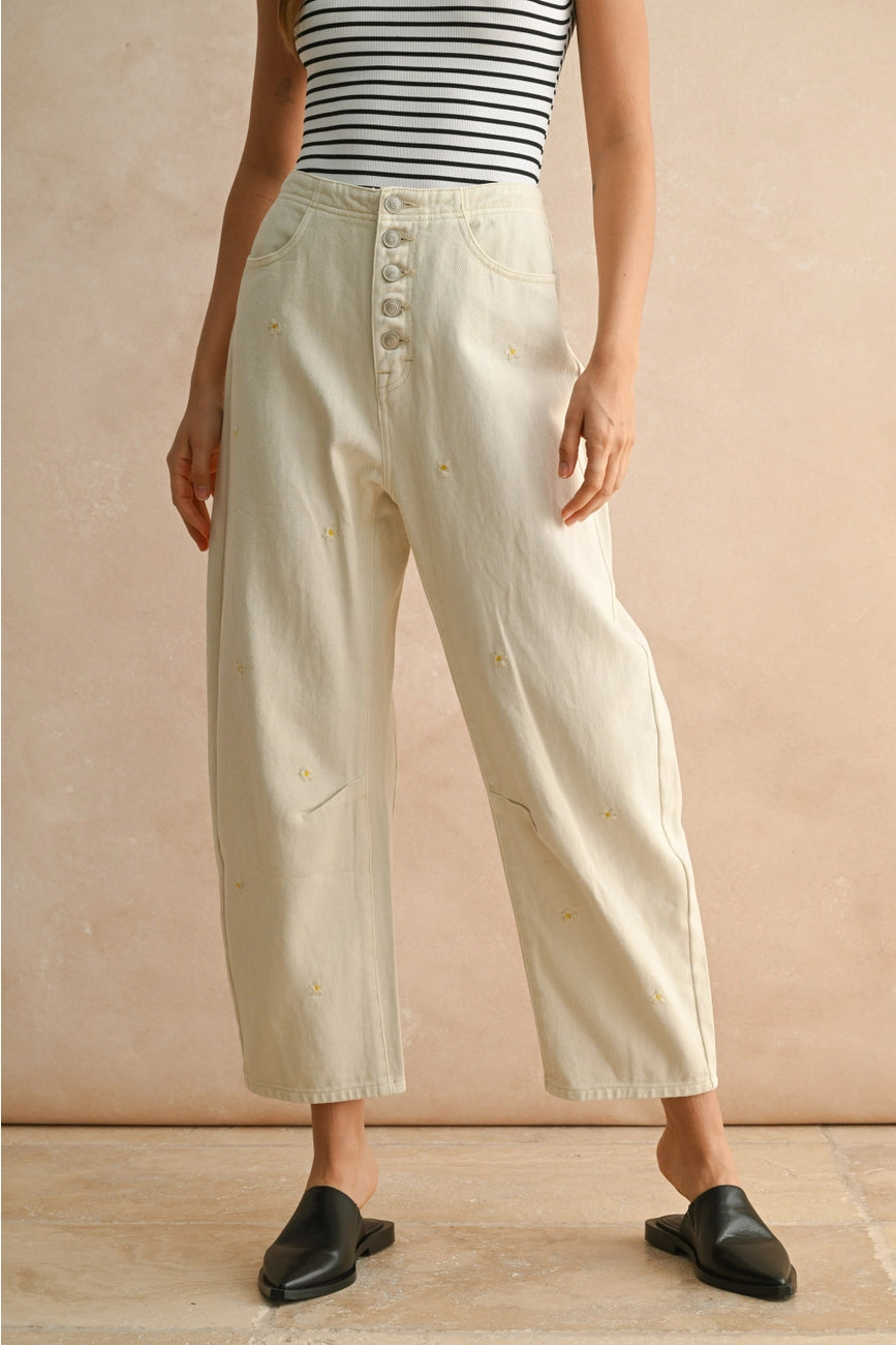 Embrace the sweetness of summer with these cute floral embroidered relaxed fit women's jeans at Harbour Thread boutique in Burlington, VT. 