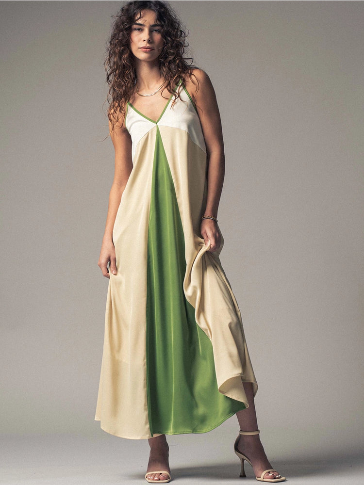 
                      
                        This cool and colorblocked relaxed fit maxi dress at Harbour Thread Burlington is crafted in a lightweight satin fabric for a beautiful drape.
                      
                    