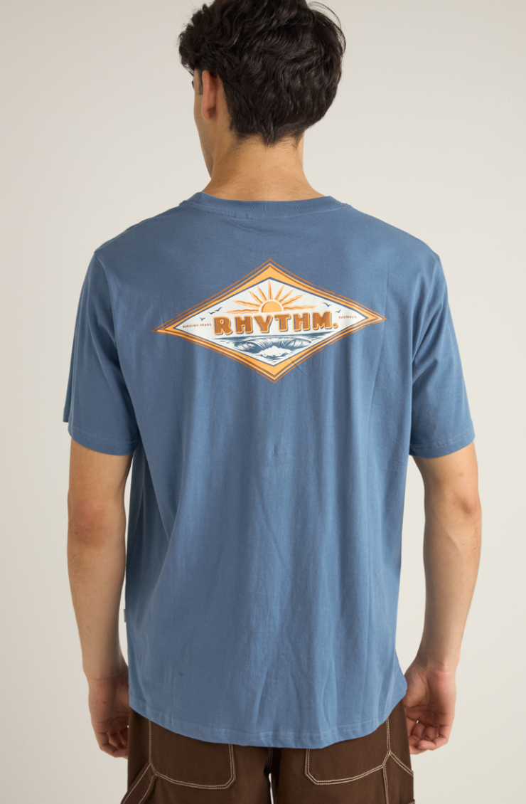 This short sleeve tee from Rhythm features a custom ocean waves and sun screen print on the back. 