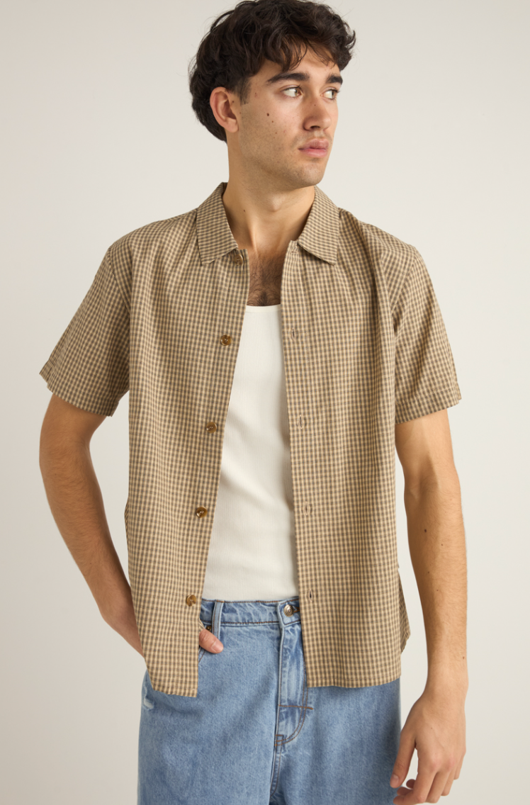 Enjoy relaxed, understated warm-weather style with the Check Short Sleeve Shirt by Rhythm, now available at Harbour Thread Burlington.