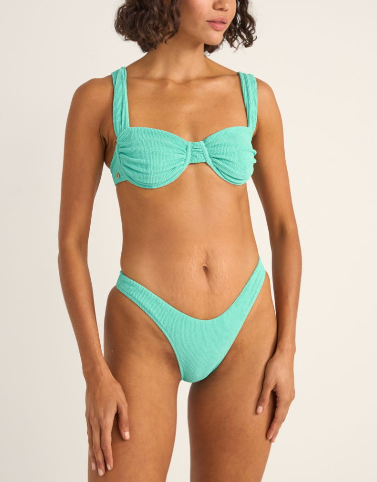 Enjoy soft and supportive swim style with the Isla Rib Soft Strap Balconette Bikini Top from Rhythm, available at Harbour Thread Burlington. 