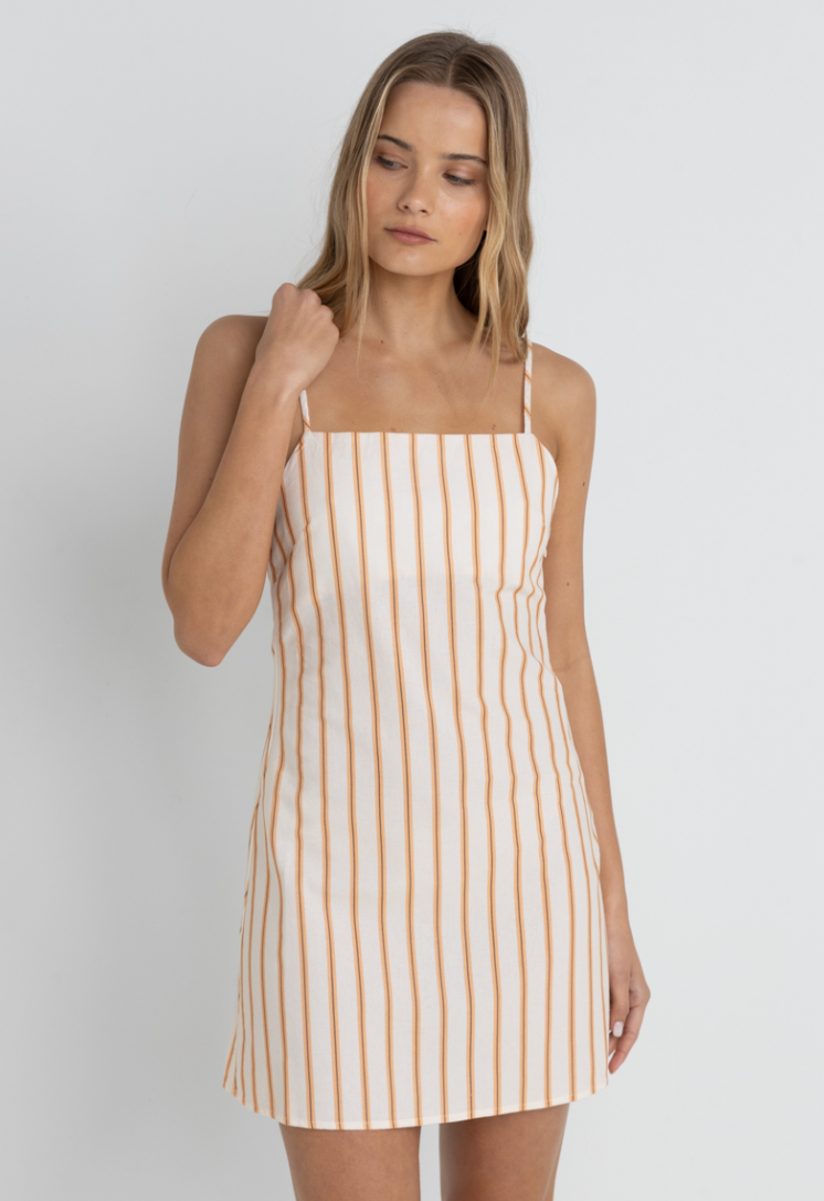 Make your way from beach to bar in style with the cotton-linen blend Tide Stripe Mini Dress from Rhythm, available now at Harbour Thread Burlington. 
