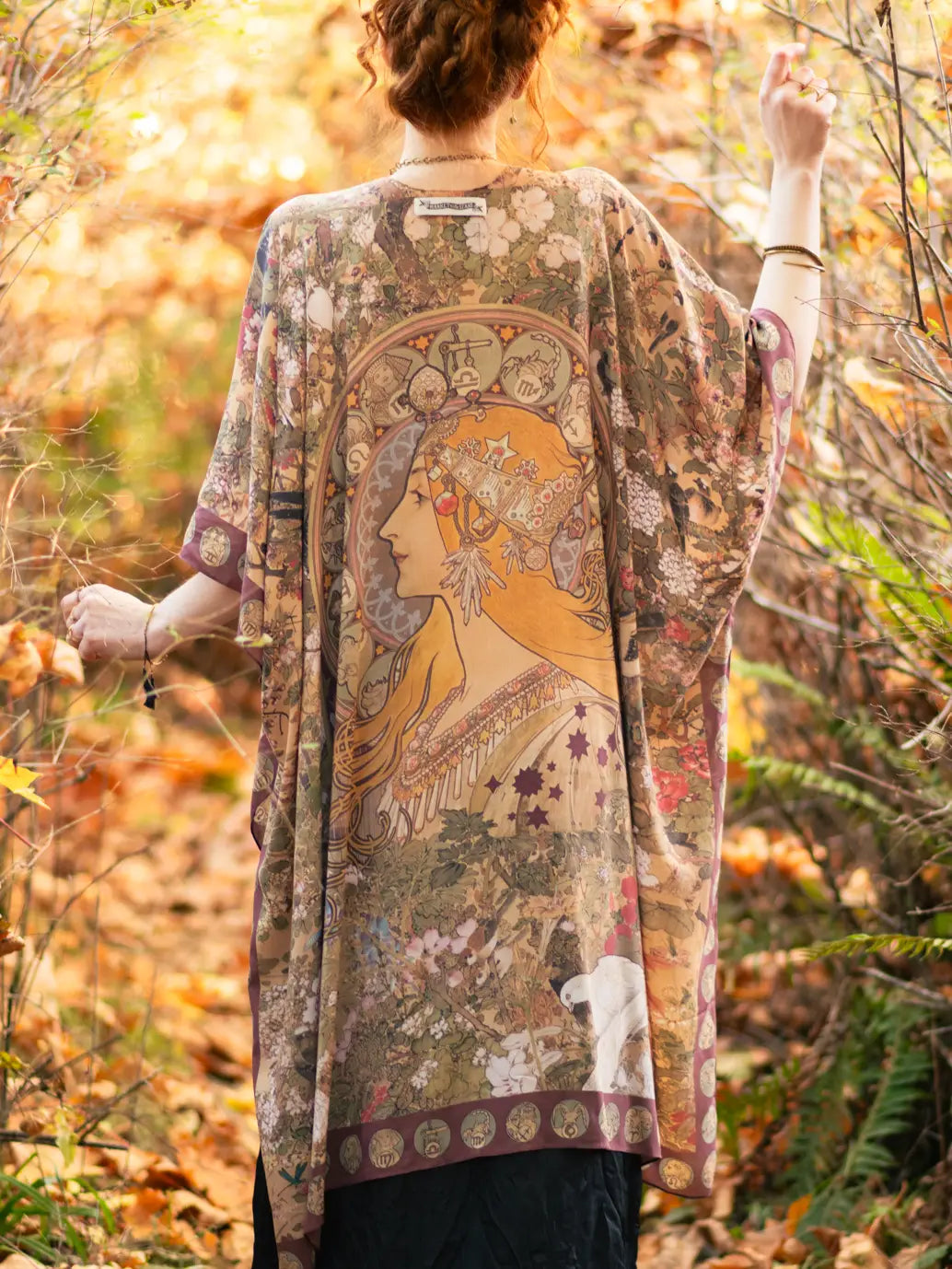 Back view of the Dreamweaver Zodiac Kimono by Market Of Stars featuring a woman and zodiac designs