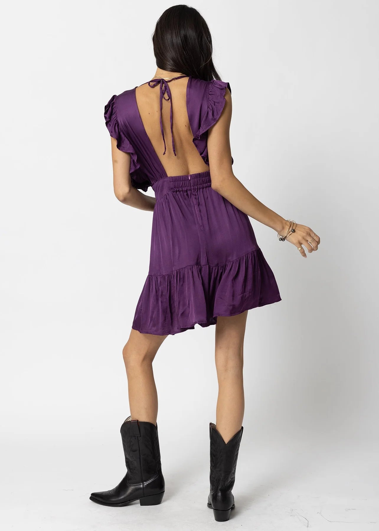 Back view of Stillwater's The Jessie Mini Dress in the color Deep Purple