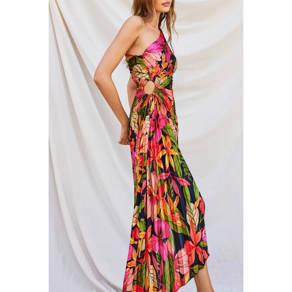 This colorful tropical floral one shoulder dress at Harbour Thread is perfect for your next vacation getaway or a summer night out on the town. 