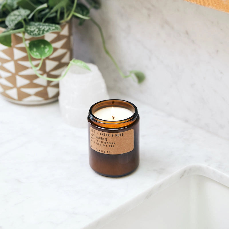 
                      
                        P.F. Candle Co.'s Amber & Moss Soy Candle - 7.2 oz
                      
                    