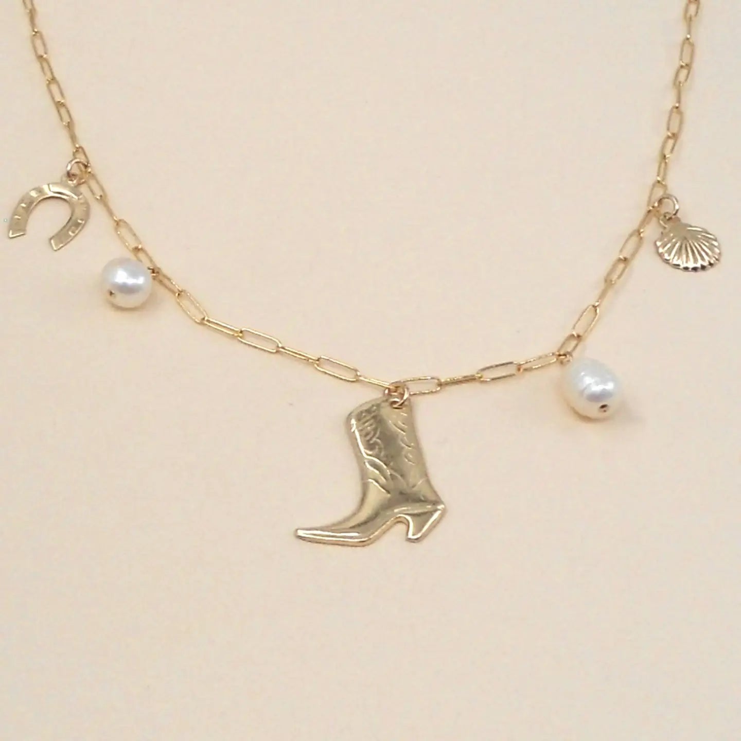 Charm detail on the Sea Ranch Charm Necklace by May Martin.