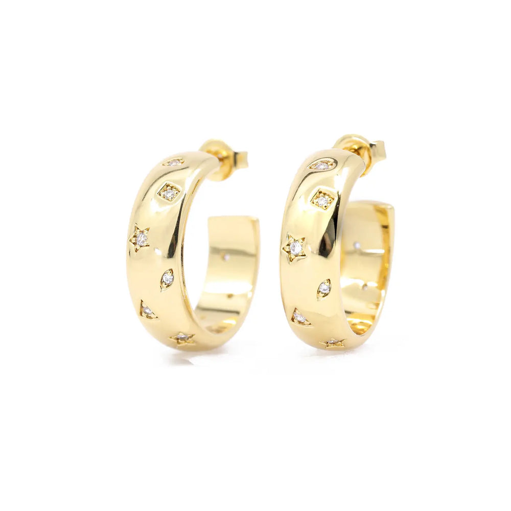 The Gold Constellation Biggie Hoop Earrings from The Land Of Salt.