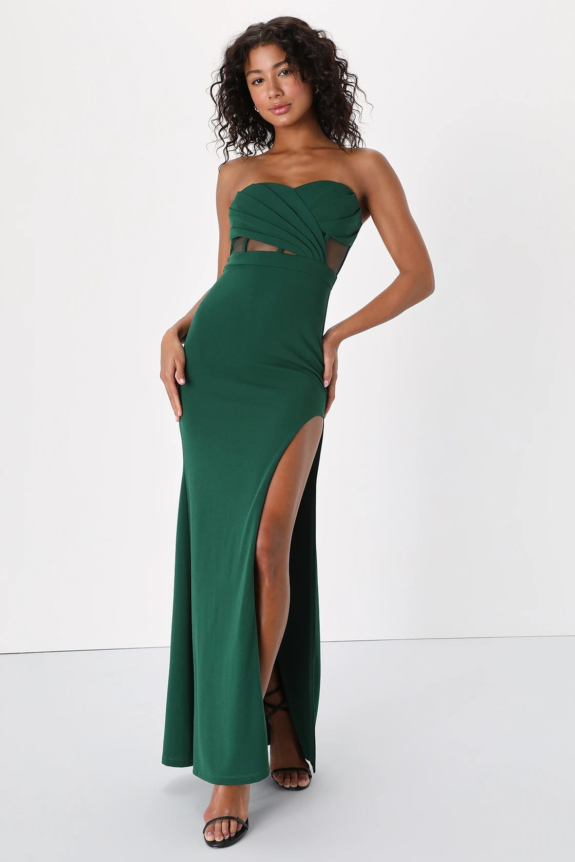 Front view of a woman wearing an Emerald Green Pleated Strapless Bustier Dress by LuLu's