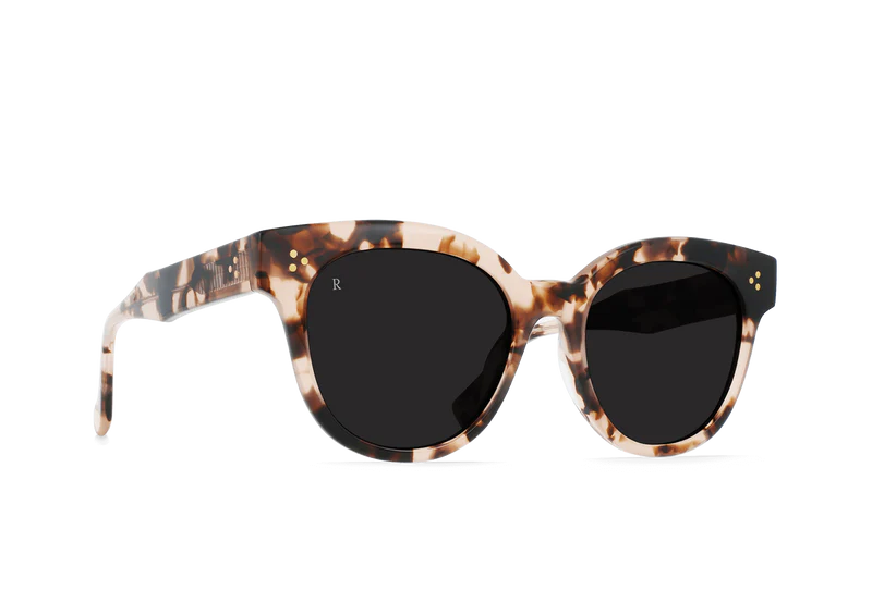 
                      
                        Front/Side view of the Coral Tortoise frame Nikol Women's Cat-Eye Sunglasses by RAEN
                      
                    